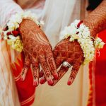 hindu-bride-shows-her-hands-covered-with-henna-tattoos