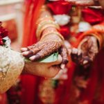 ritual-with-coconut-leaves-during-traditional-hindu-wedding-ceremony
